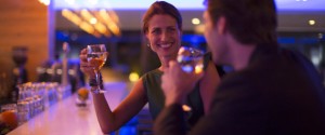 Couple drinking wine in a hotel bar